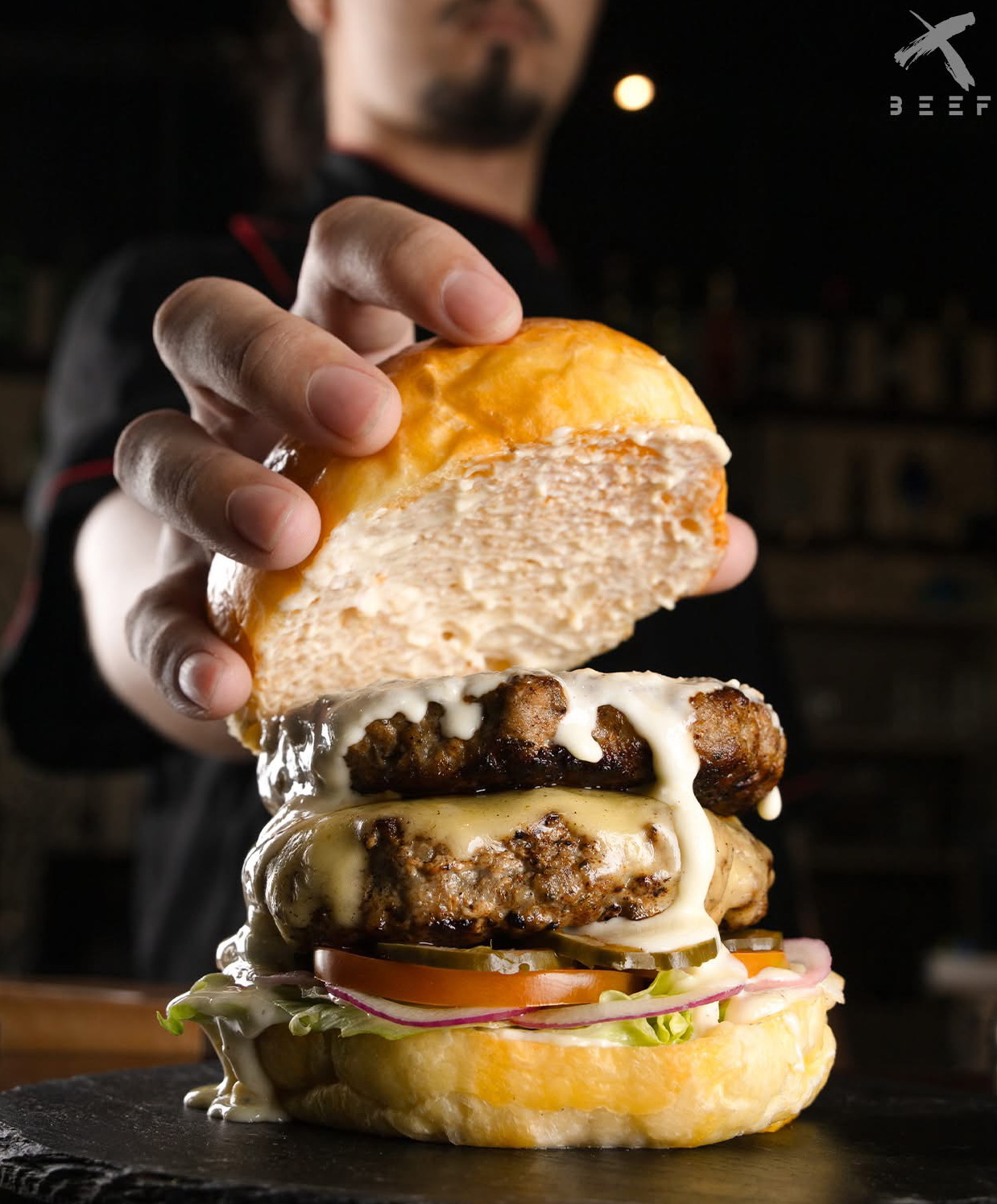 X BEEF burger with melted cheese