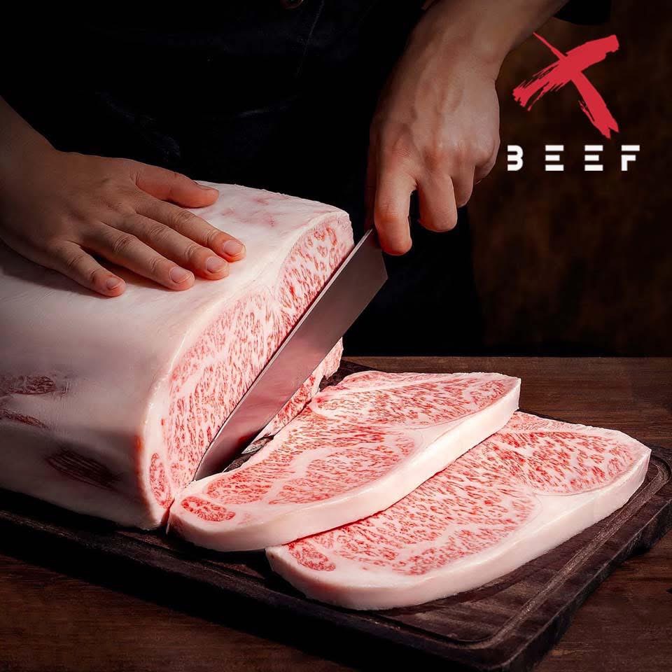 Marbled beef being sliced at X BEEF
